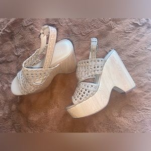 Brand new never worn. Beige wedges. Size 6.5 Women’s.